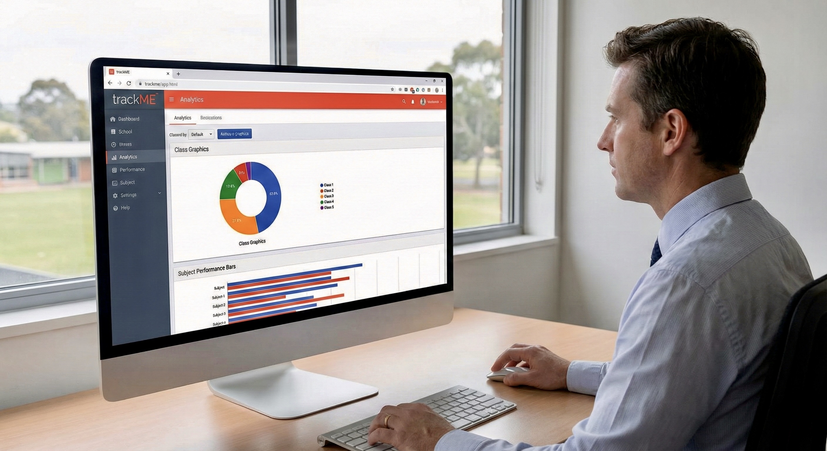 School administrator reviewing analytics on desktop
